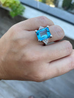 12x10mm Emerald Cut Fancy Blue Topaz Ring